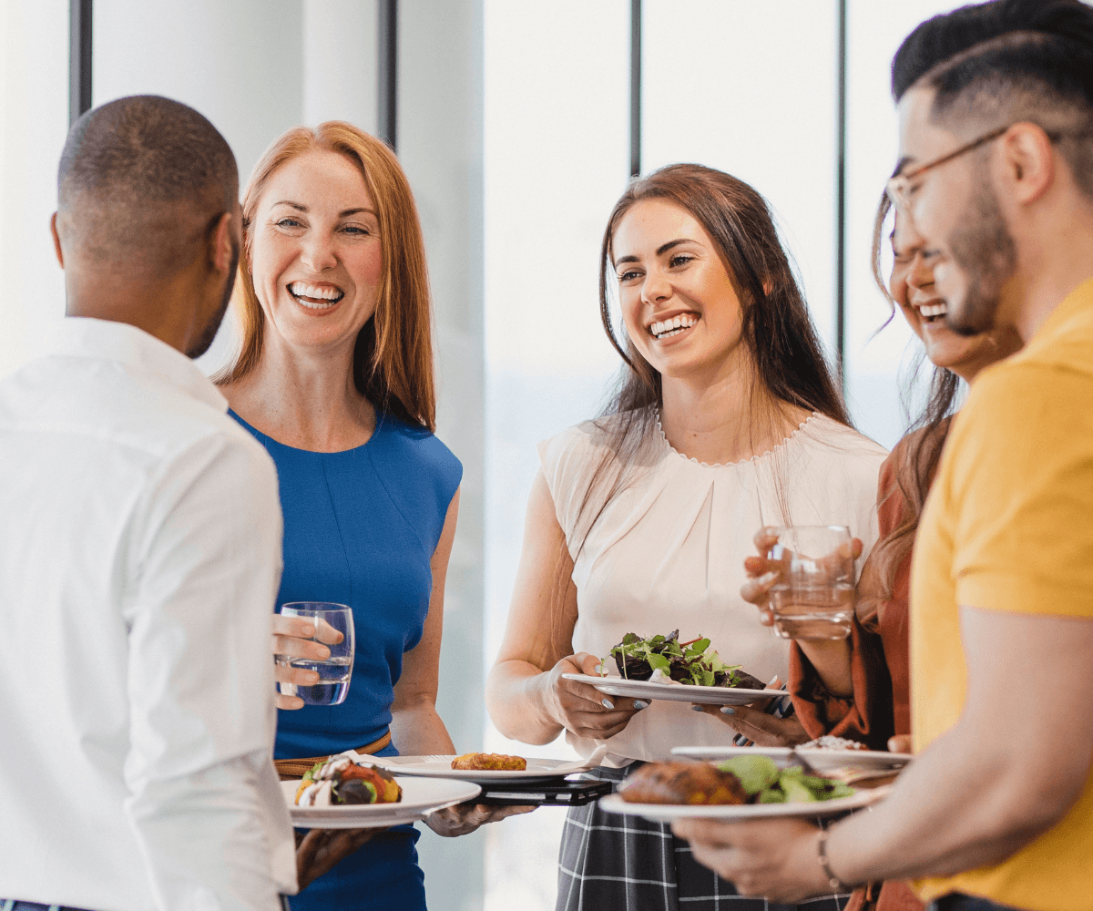 Business professionals enjoying a company event and buffet at The Park Hub, Master Park, Oxted.